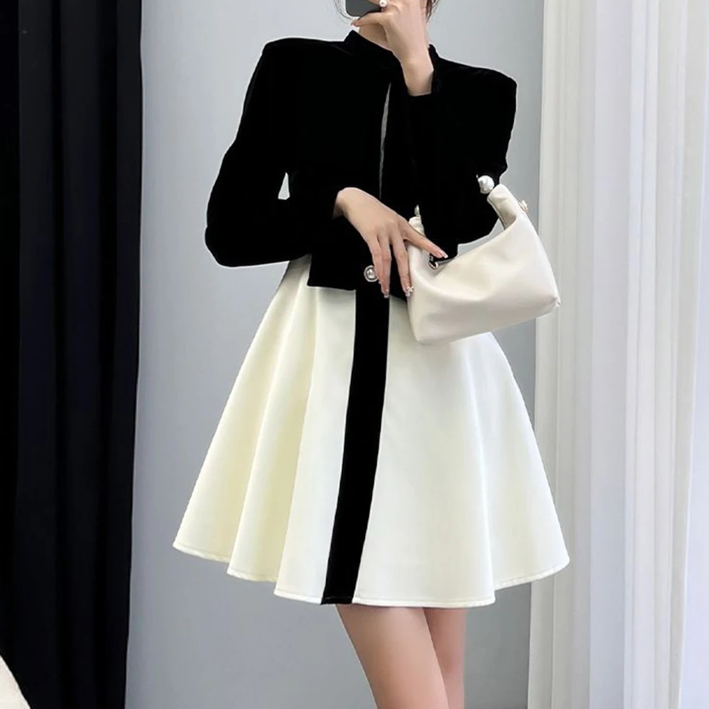 

French light luxury high-end black and white matching dress women's 2025 autumn new temperament with small skirt