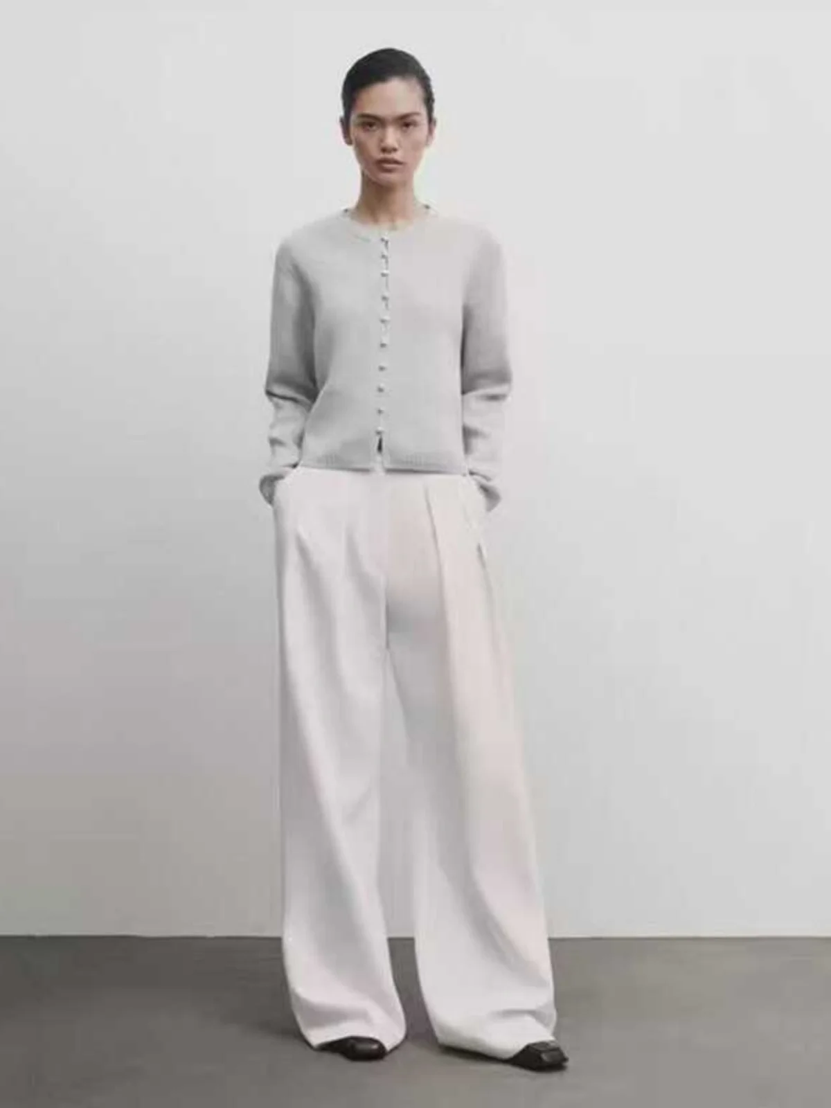 เสื้อคาร์ดิแกนถักแบบเปิดทรงหลวม สไตล์เรียบง่าย หวานละมุน สำหรับผู้หญิง ฤดูใบไม้ผลิ 2025 ทรงสตรีท แขนยาว ทรงปกติ