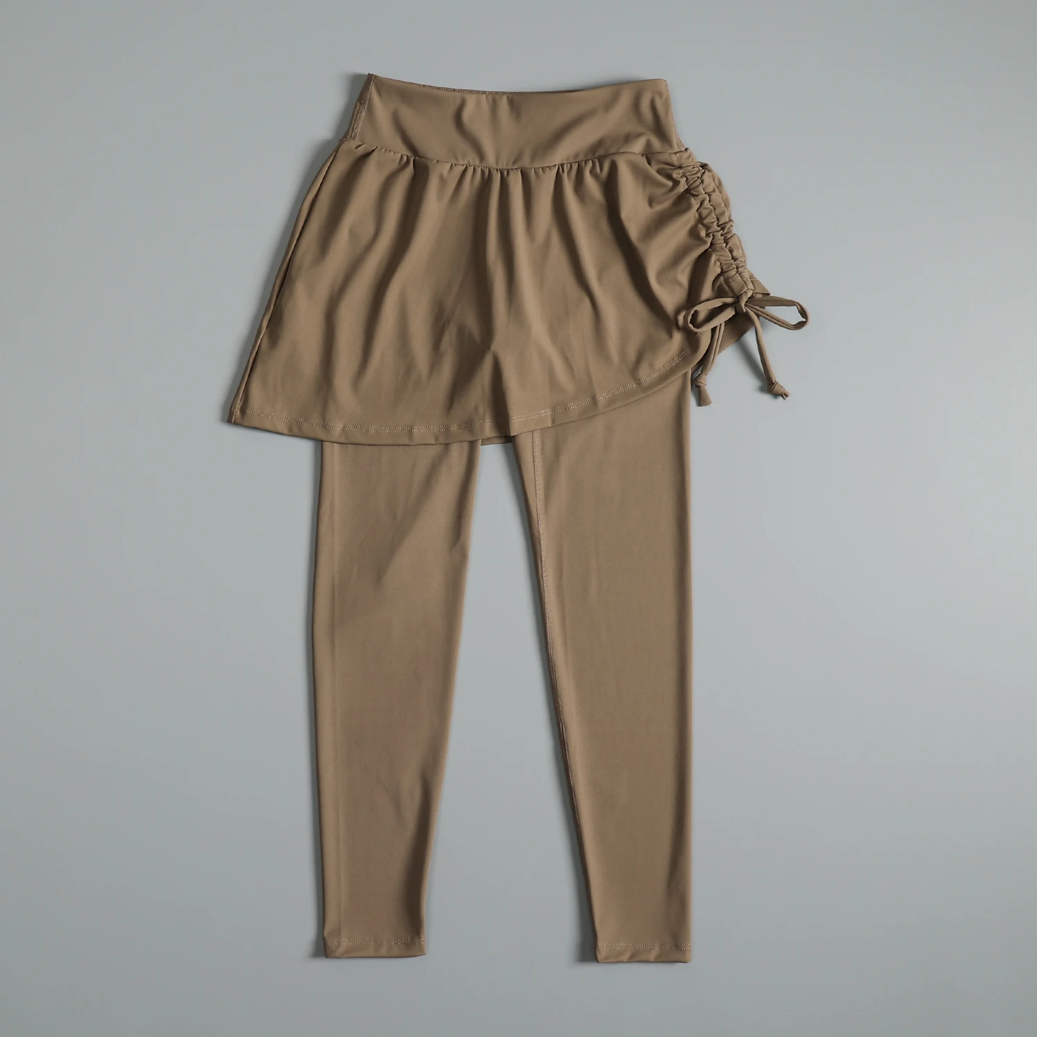 

Женские брюки для фитнеса с завышенной талией и застежкой на животе, состоящие из двух частей, чтобы прикрыть бедра, чтобы сделать их выглядеть тонким и облегающим эффектом.