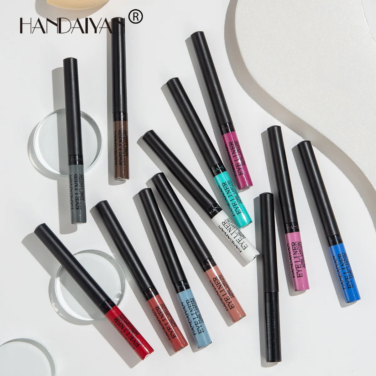 Handaiyan อายไลเนอร์น้ำ UV 12สีกันน้ำแห้งเร็วอายไลเนอร์เคลือบอัลตราไวโอเลตติดทนนานเครื่องสำอางแฟชั่นสำหรับงานเลี้ยง