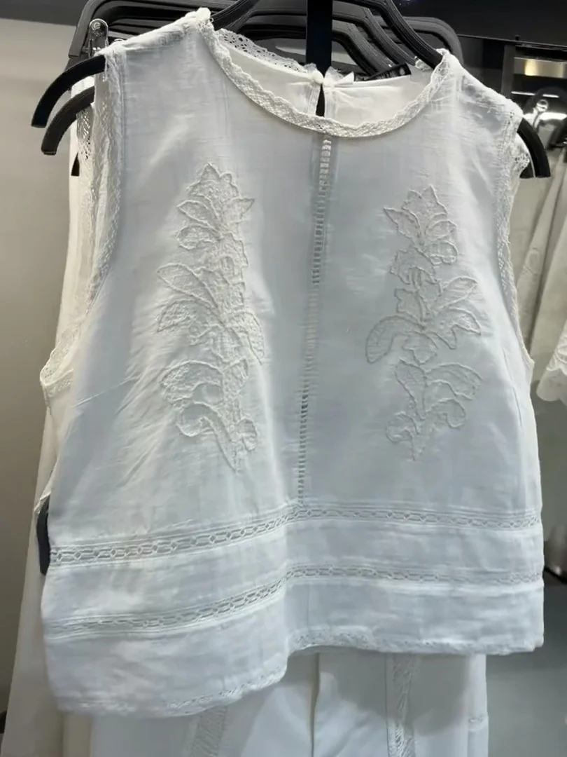 เสื้อครอปลำลองผ้าฝ้ายแท้ทรงหลวมสำหรับผู้หญิง รุ่นปักลายรอบตัว สไตล์หวานๆ สำหรับวันพักผ่อนริมชายหาด ซัมเมอร์ 2025