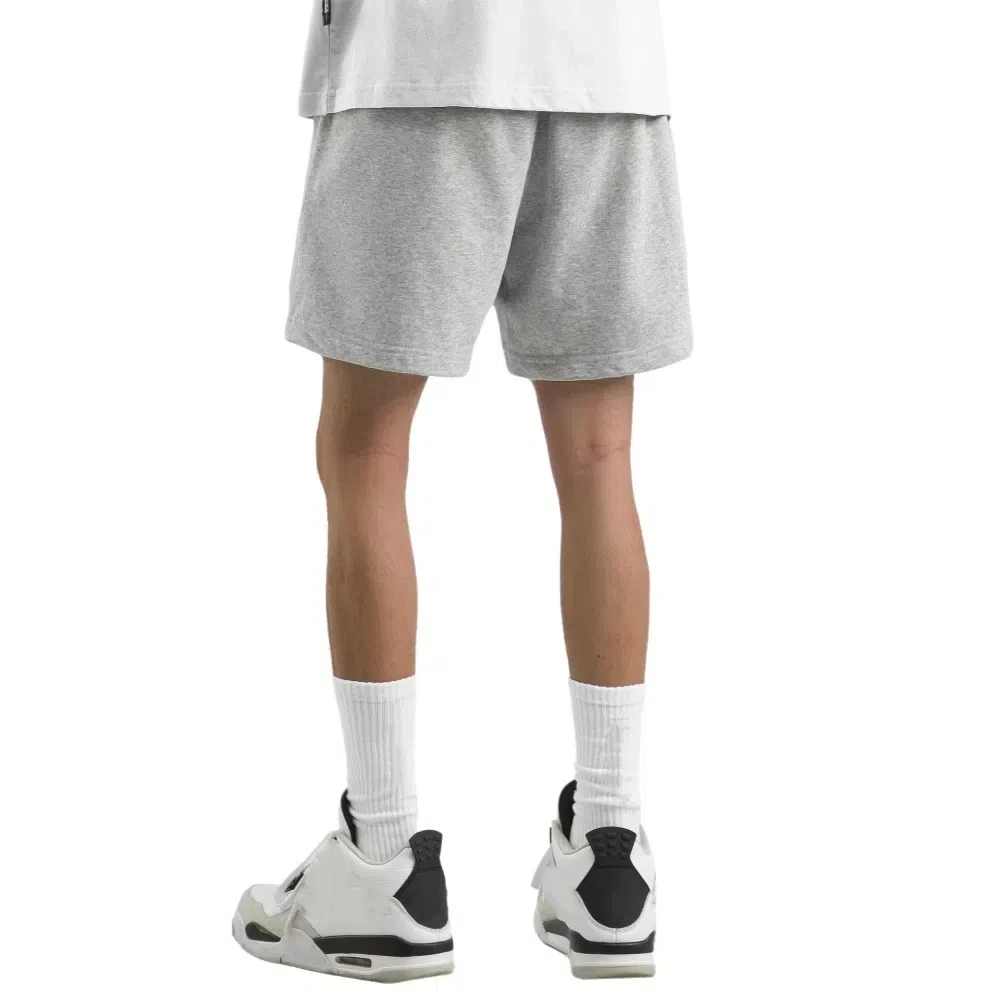 Pantaloncini semplici larghi a vita alta con lacci Pantaloni larghi a mezza gamba tinta unita Pantaloncini causali con coulisse sottile Uomo Maschio