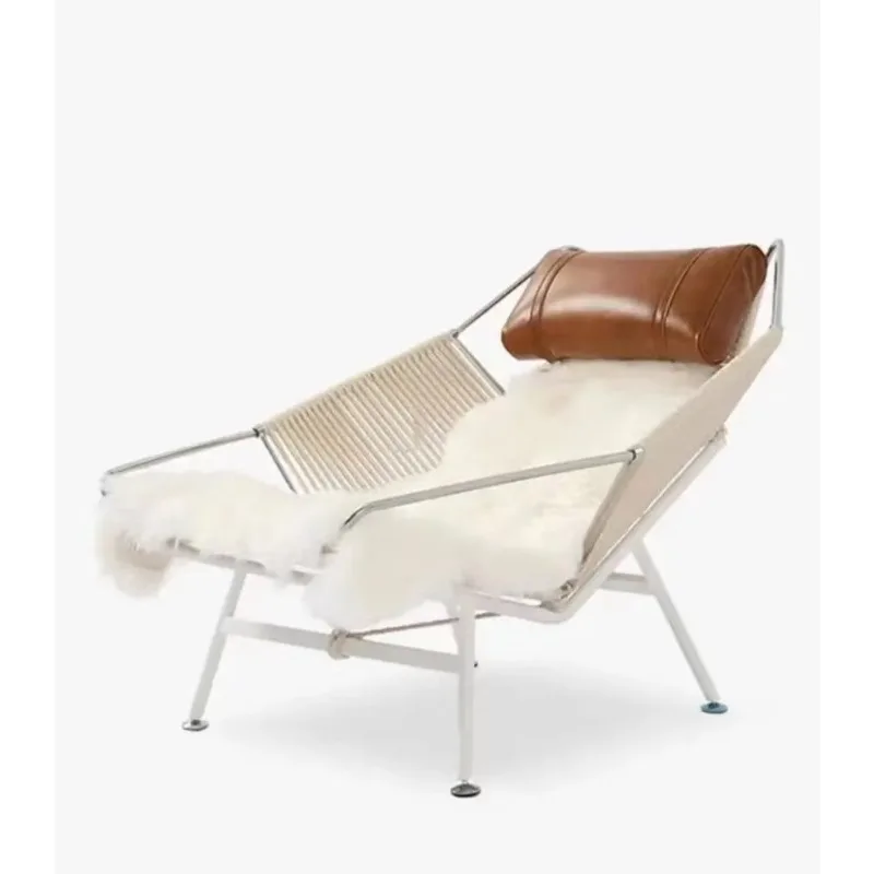 White blanket, brown headrest, back chair