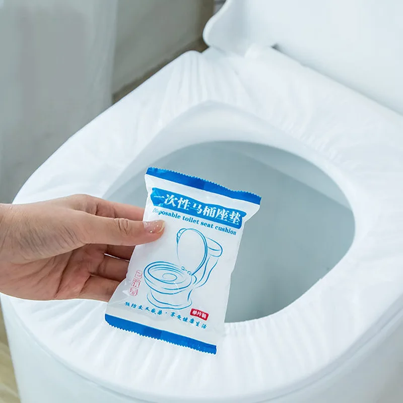 Cuscino per sedile WC monouso portatile WC all'ingrosso Non tessuto da viaggio in cotone Hotel copriwater per uso domestico confezione singola impermeabile