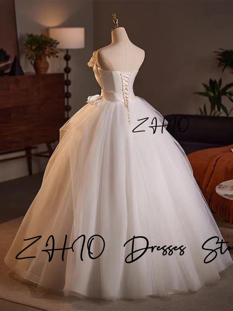 ZHIO Principessa Fiori 3D Abito da sposa Senza spalline A-Line Lunghezza pavimento Tulle avorio Corea Servizio fotografico Abito da ricevimento nuziale Personalizzato