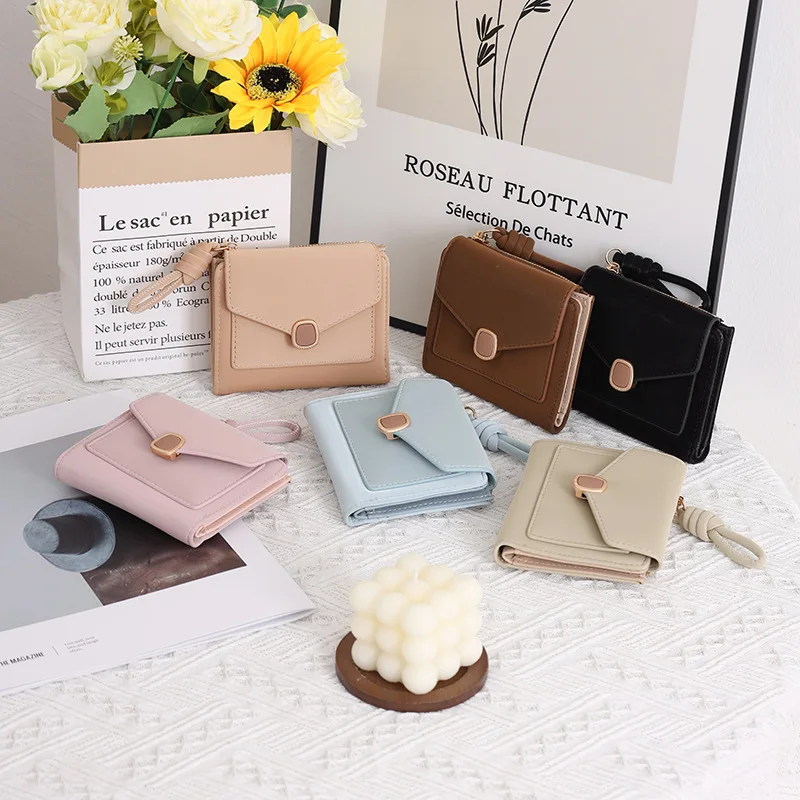 

PU Ladies' short three-fold multi-slot coin pocket buckle lightweight small wallet student coin purse