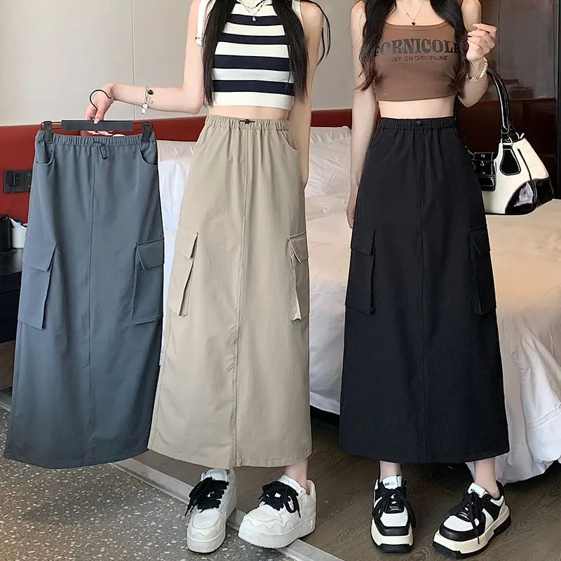 

Юбка миди А-силуэта с высокой талией, женская, повседневная, для работы, лето 2023, с эластичным поясом, утягивающая, с разрезом, в корейском стиле, однотонная, для офиса