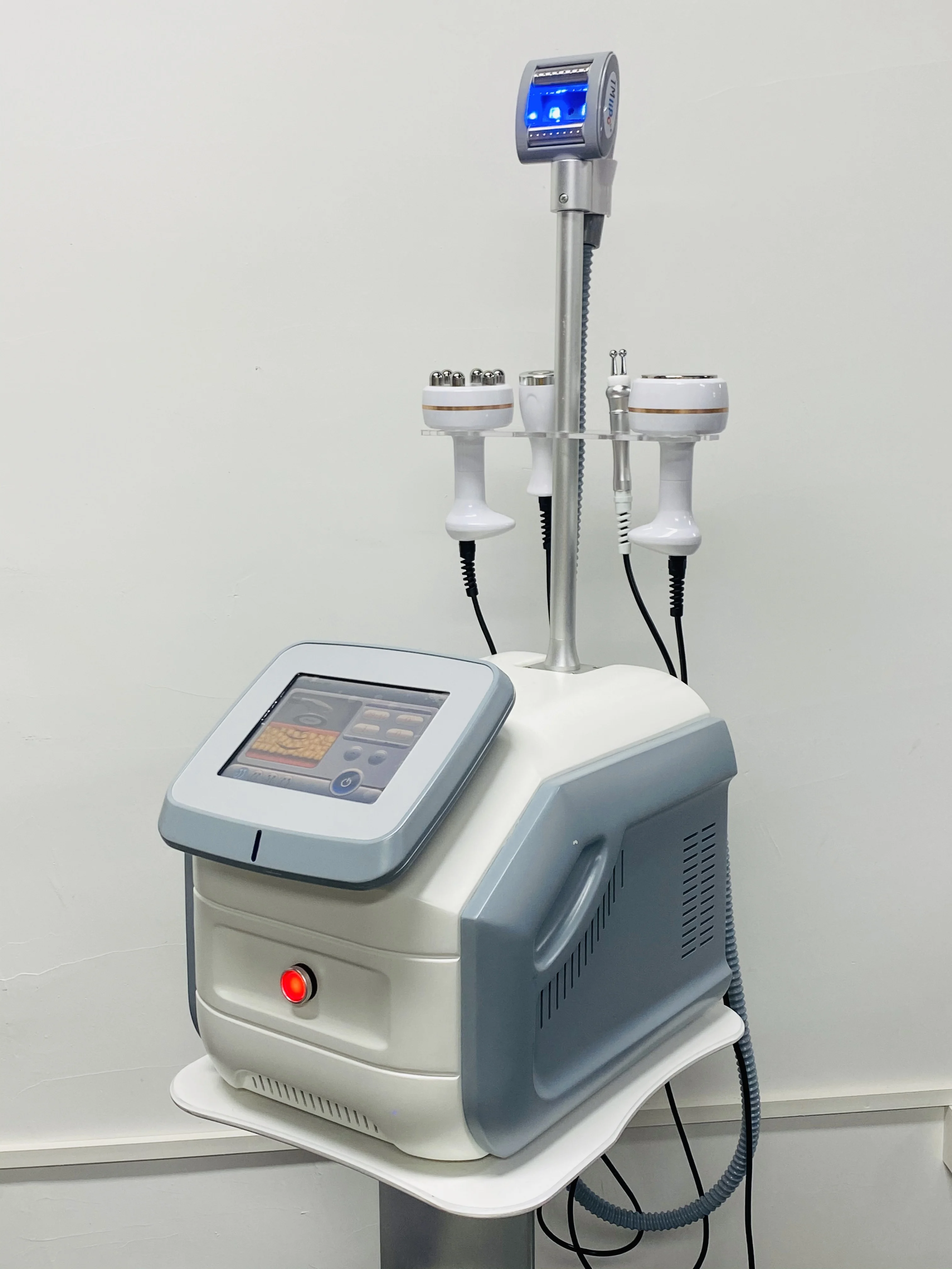 آلة تدليك غاز البترول المسال شكل الجسم فراغ شد الوجه التجويف متعدد الأقطاب الأسطوانة معدات التخسيس فقدان الوزن العمودي