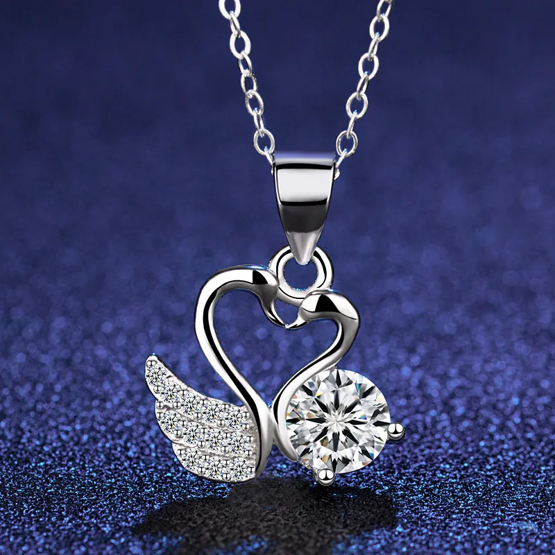 White copper pendant electroplated with thick platinum finish featuring heart motif and lucky cat charm ideal for fashion-forwar