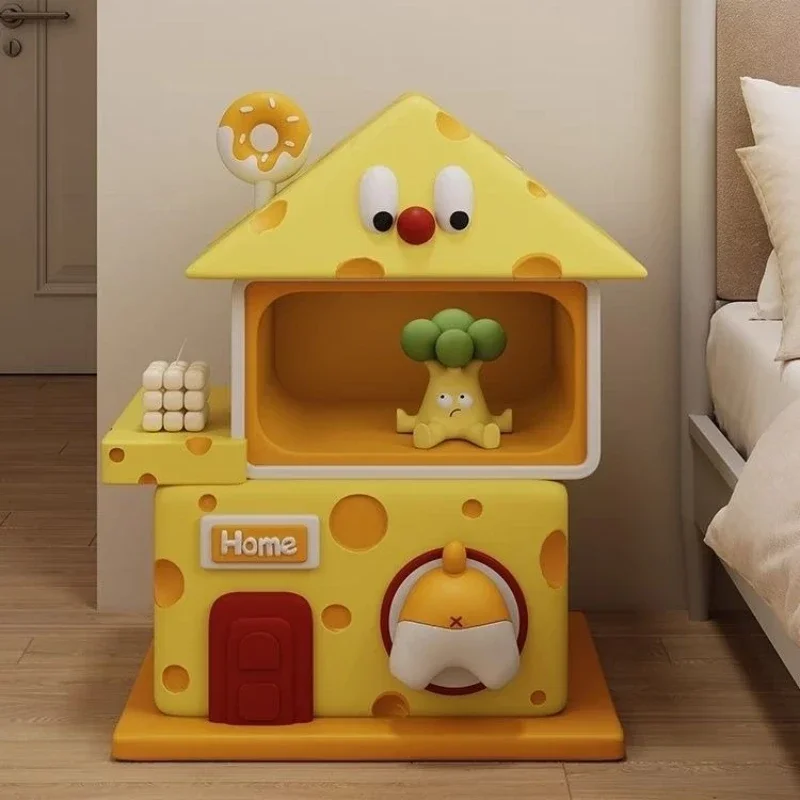 Cartoon large floor-to-ceiling ornaments, bedside table next to the sofa, snack storage cabinet decorations