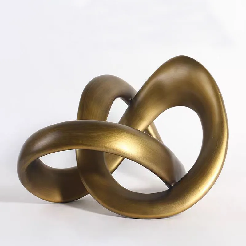 

Modern luxury gold resin art desktop living room twist crafts hotel party decoration