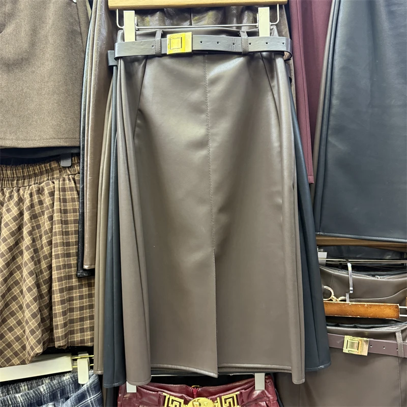 Light and mature temperament black split PU leather half skirt women's autumn new high-end slimming hip hugging skirt