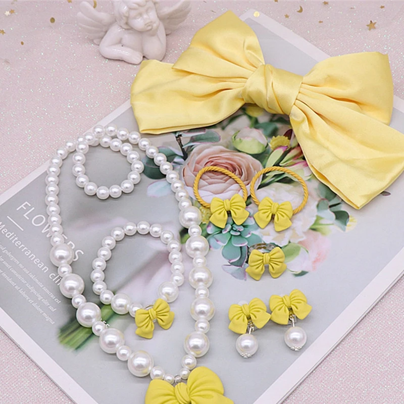 4Pcs Cute Bow Pendant Pearl Necklace Bracelet Ear Clip Children\'s Necklace Set Girl Hairpin Hair Accessories Children\'s Gift