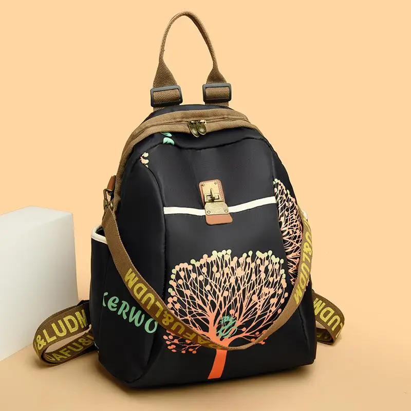 Large Capacity Lucky Four Leaf Clover Backpack for Women Casual Oxford Cloth Travel Bag Fashionable 2026 New Style Ladies Bag