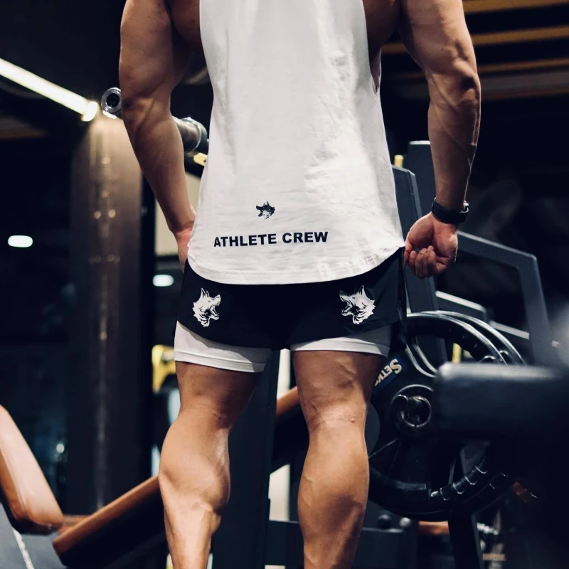 Camiseta deportiva sin mangas con dobladillo curvo para hombre, ropa informal de entrenamiento para gimnasio, chaleco de culturismo, camisetas de Fitness musculosas