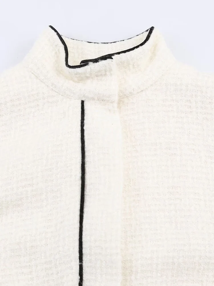 Nowy modny damski płaszcz w stylu europejskim i amerykańskim, luźny, z blokami kolorów, stójką i długimi rękawami.