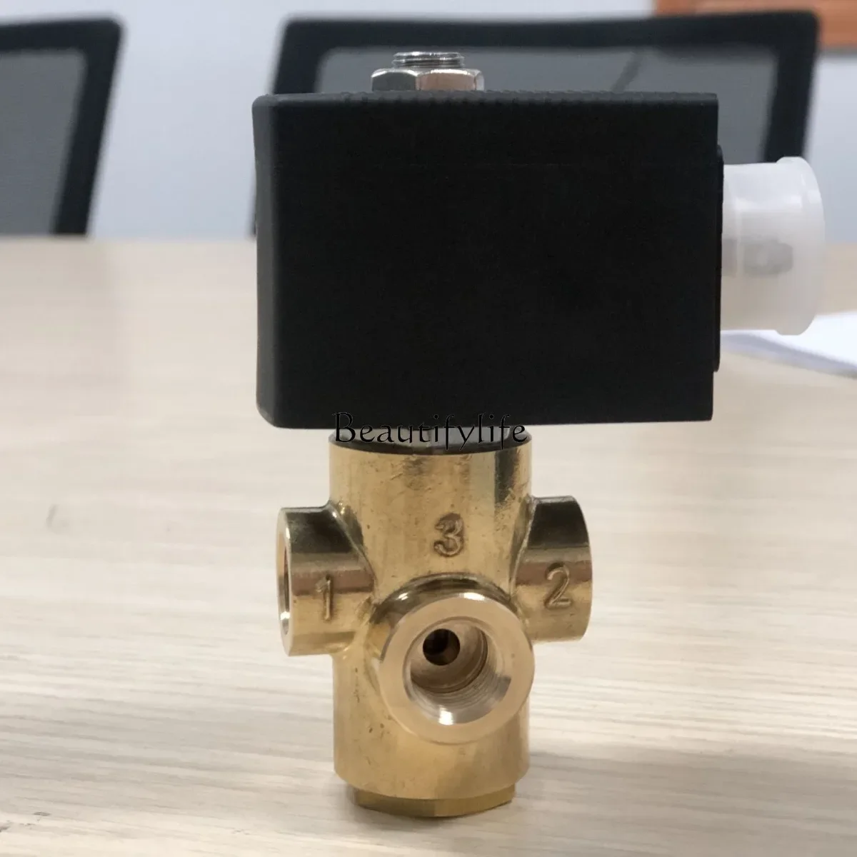 Three-way solenoid valve, a variety of connections