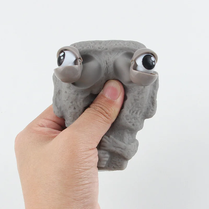 يطلق الرجل الحجري لعبة الضغط على انتعاش ببطء تمثال موي الناعم يضغط العينين التعبير المهتم يراخ الإجهاد هدية الأطفال