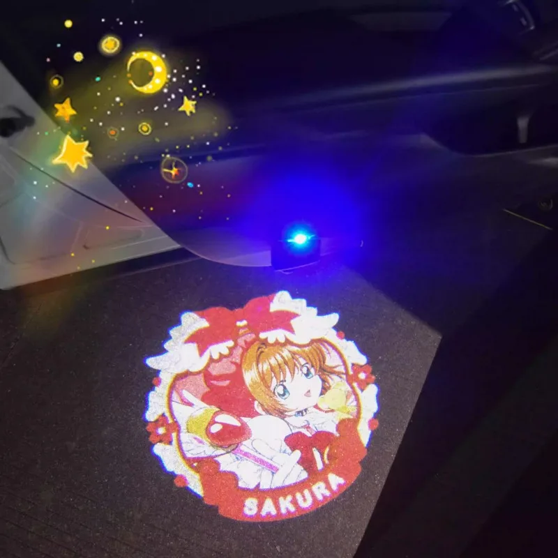 CardCaptor Sakura-luz de proyección para puerta de coche, dibujos animados, personalidad creativa, carga inalámbrica, luz de bienvenida, regalo de vacaciones