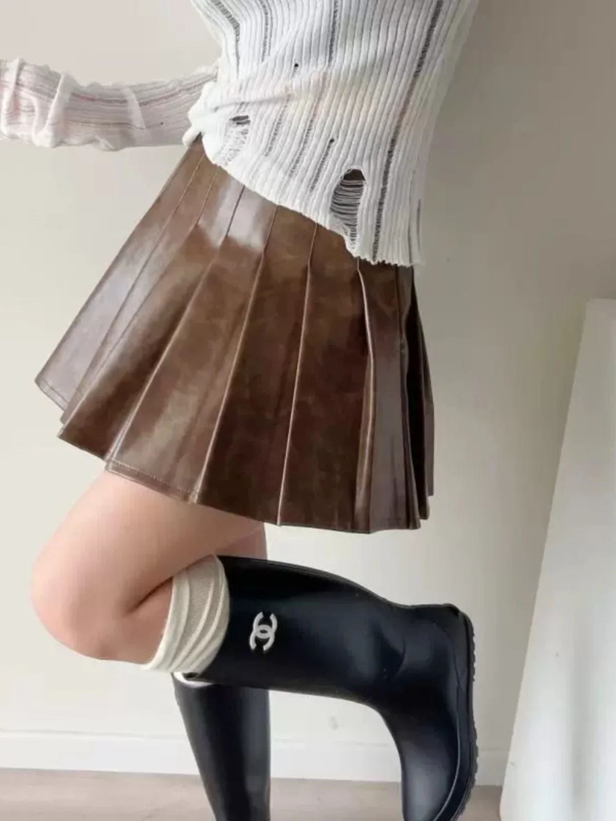 Falda americana Sle de cintura alta para mujer, falda ort de Color que se decolora, de cuero, antiligera, diseño acera, calle Sle