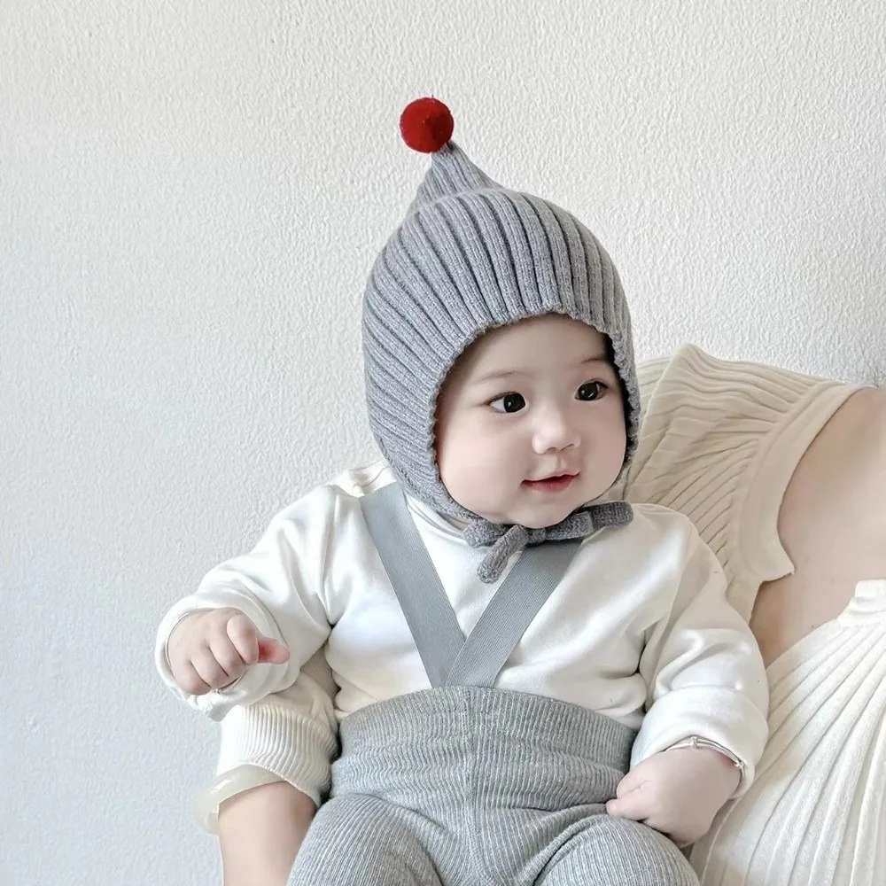 

New High Quality Cute Solid Color Baby Knitted Hat Warm Lacing Design Kids Pullover Hats Woolen Ear Protection Infant Beanie Cap