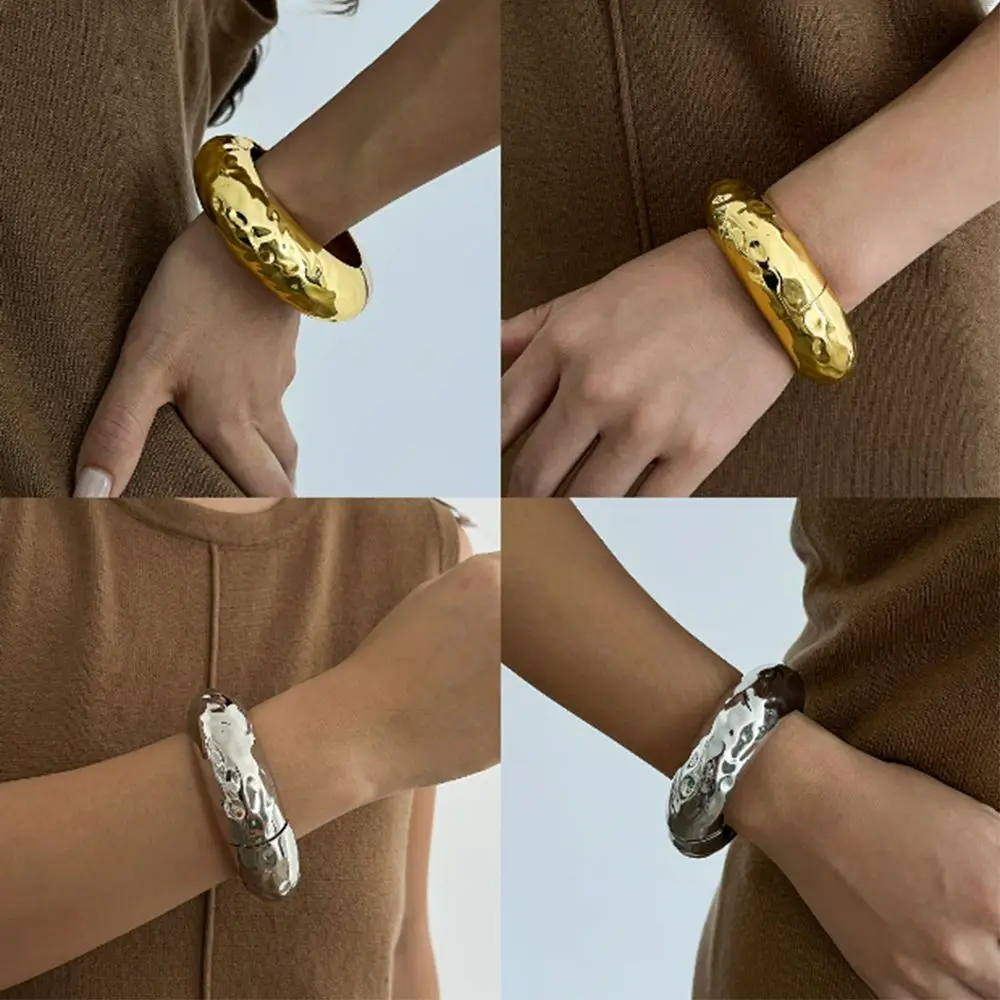 女性用ラウンドワイドパターンブレスレット,メタルハンドチェーン,不規則なハンドジュエリー,プレミアムニッチ,エレガントなファッション,春