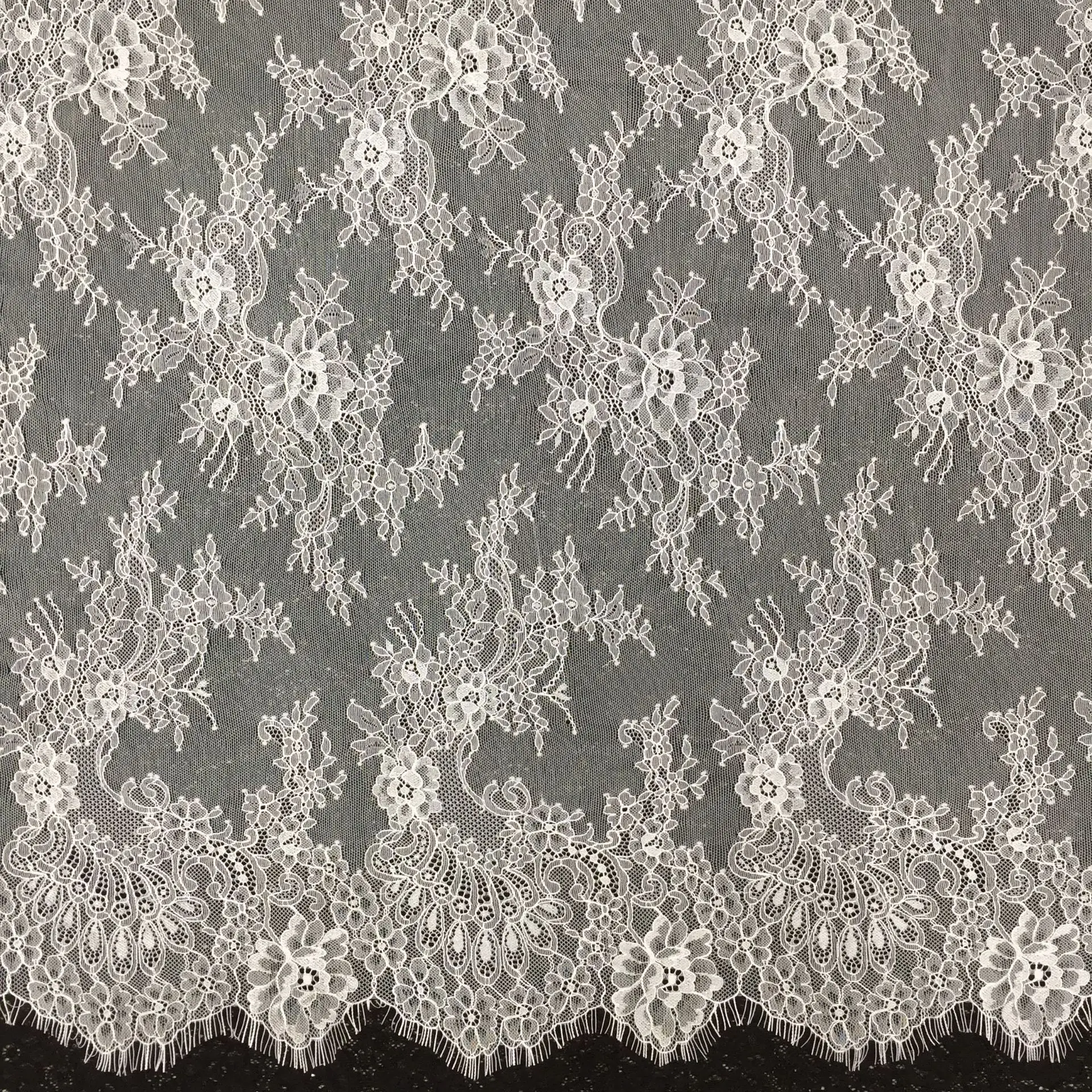 เสื้อยืดซีทรูผู้หญิงแขนยาวยาวพิเศษไม่สม่ำเสมอชายเสื้อบางเที่ยงคืนแนวโน้มที่เรียบง่ายสตรีทฤดูใบไม้ผลิฤดูร้อนเสื้อลูกไม้