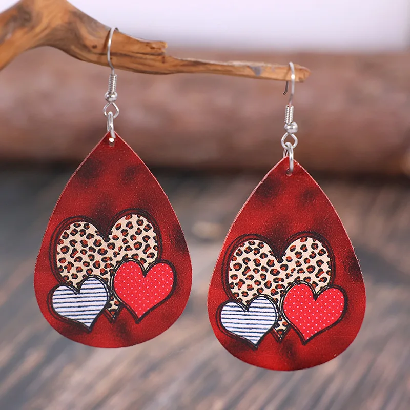 New Valentine's Day leather earrings, retro water drop-shaped leopard print peach heart earrings, double-sided leather earrings.