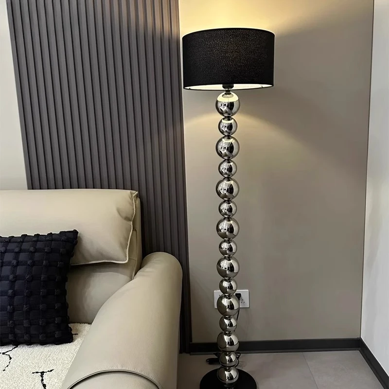 

Floor lamp living room high-end light luxury sofa next to bedroom room atmosphere stainless steel fabric decoration