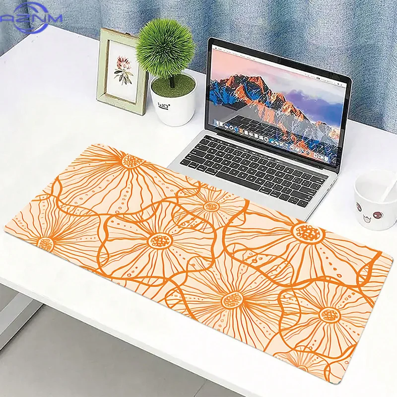 Bohemian-Style Large Mouse Pad Featuring an Aesthetic Floral Design in Orange, Perfect for Gaming Or Office Use. It Has a Non-Sl