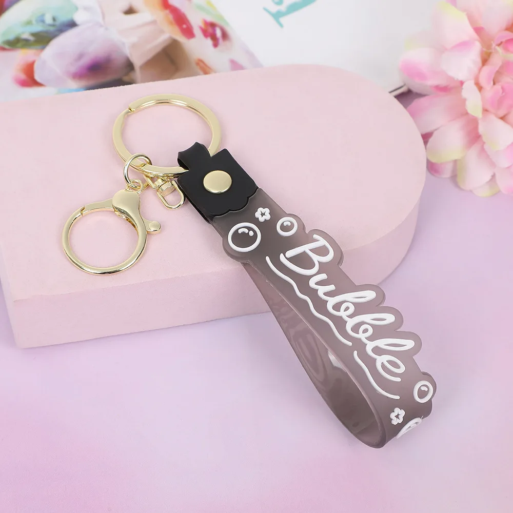 Transparent Candy Colored Pvc Soft Rubber Keychain Silicone Tape Keychain Color Changing Hand Rope Quicksand Bottle Small Gift