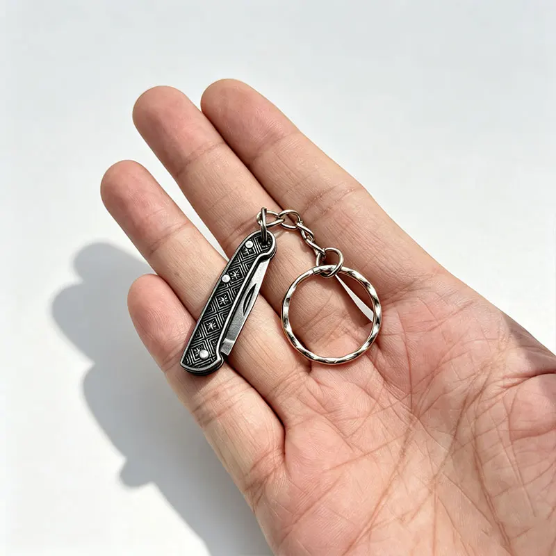 Retro pattern mini folding knife, portable small cutting tool, small knife for unpacking parcels, key pendant gift item