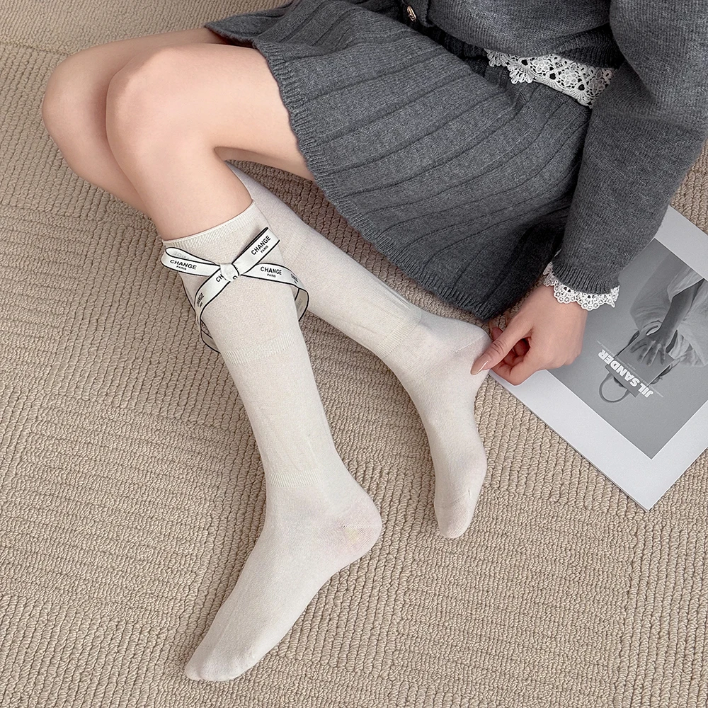 ผู้หญิง Over-the-calf ถุงเท้า Big Bow ตกแต่งแฟชั่นญี่ปุ่นถุงน่องสีทึบน่ารักเข่าความยาวถุงเท้าหญิง