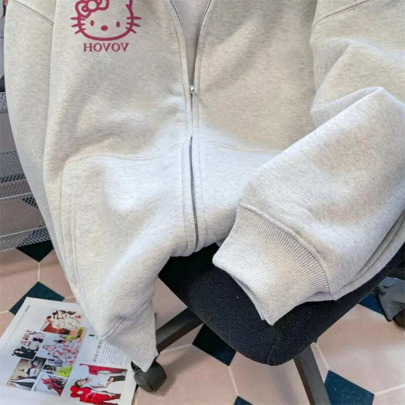 เสื้อฮู้ดผู้หญิงลายเฮลโลคิตตี้ น่ารัก สไตล์การ์ตูน สำหรับนักเรียน ฤดูใบไม้ร่วง แขนยาว มีซิป เสื้อผ้าผู้หญิง เสื้อนอก สินค้าใหม่มาแรง