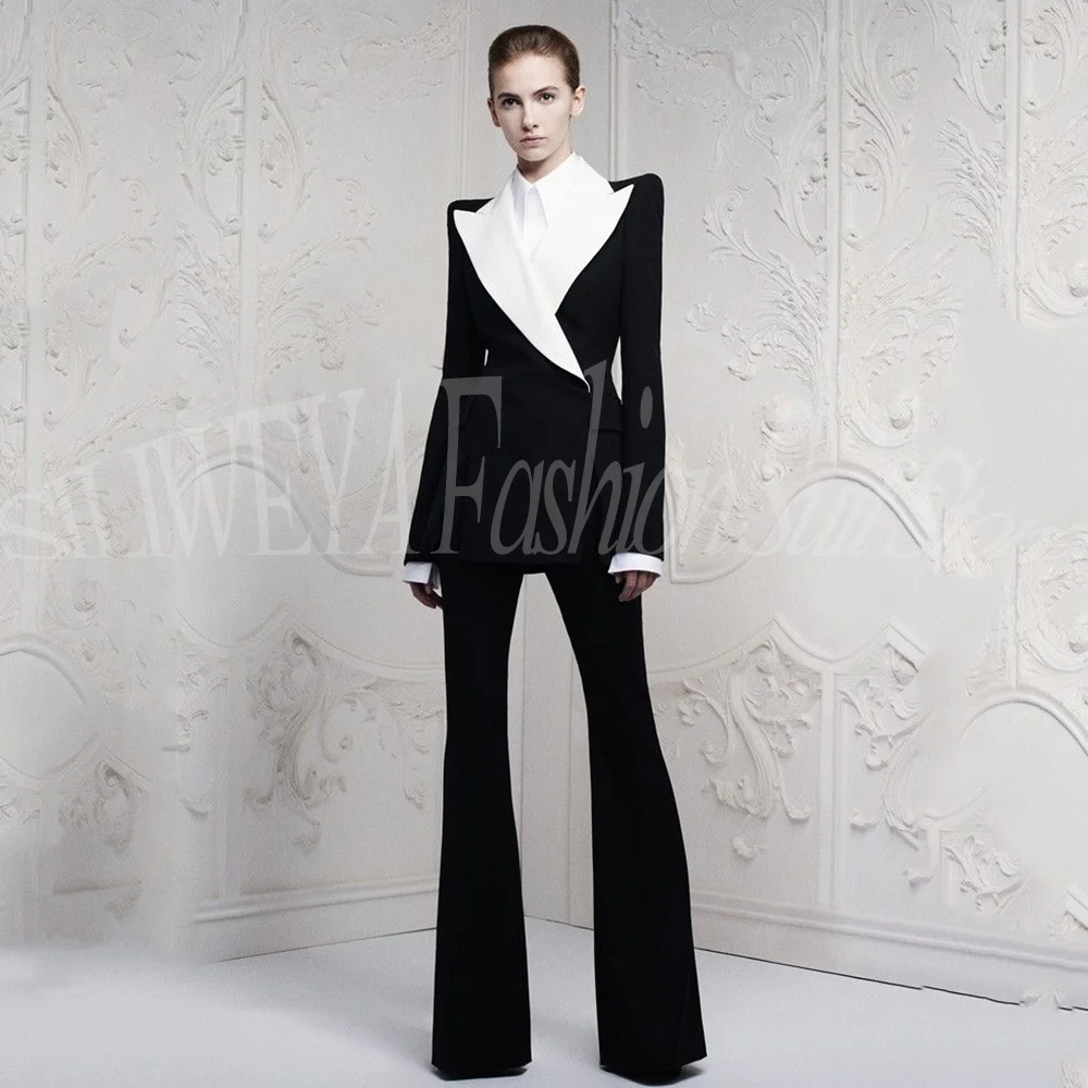 

Элегантный женский костюм-двойка: пиджак с разрезом спереди и брюки. Модный офисный, вечерний, праздничный комплект. Черный женский брючный костюм.