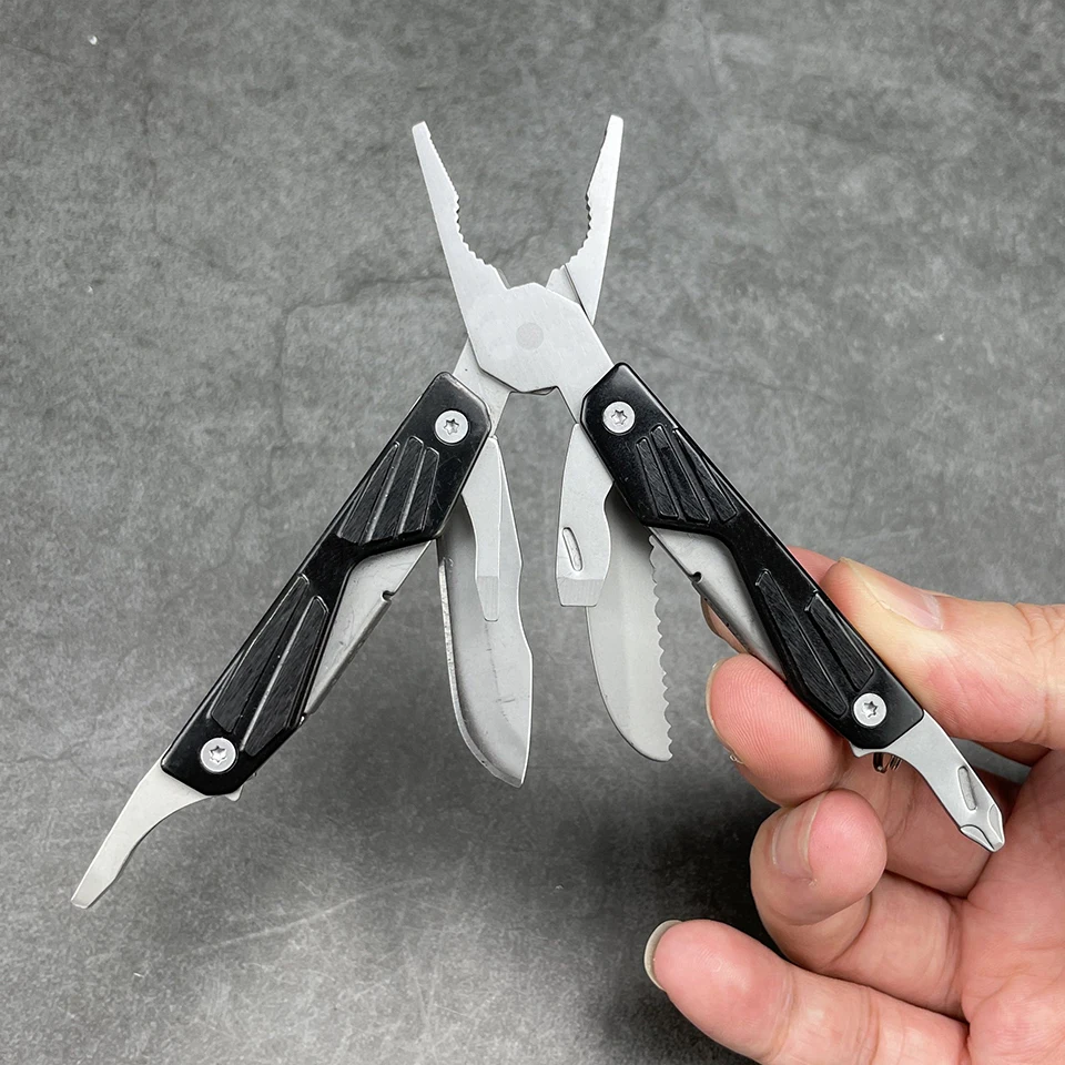 

Compact Multi-Tool Outdoor Pliers Serrated Knife Bottle Opener Tweezers Wire cutter screwdriver Survival Camping Foldable EDC