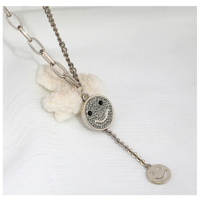 A brand-new multi-purpose autumn and winter smiling face necklace with a classic tassel mid-chain collarbone chain for women