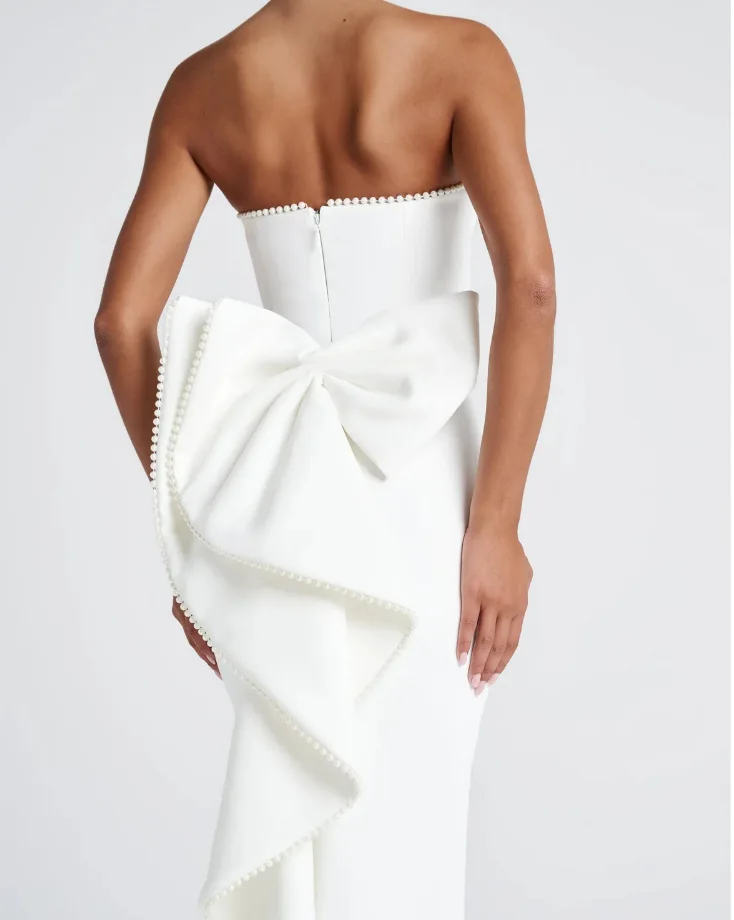 فستان أنيق للحفلات المسائية باللون الأبيض بدون حمالات بفيونكة من الخلف من الساتان غمد طول الكاحل للحفلات الراقصة فساتين رسمية مأدبة رداء السهرة