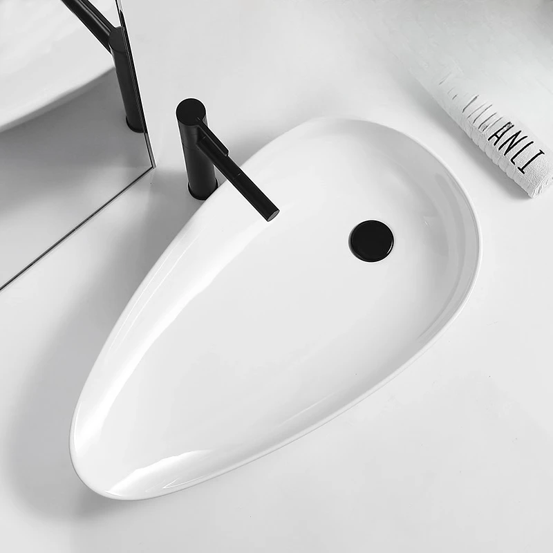 

Раковина на платформе Современная простая раковина Ультратонкая креативная раковина Персонализированная художественная раковина Керамический умывальник Запуск сбоку