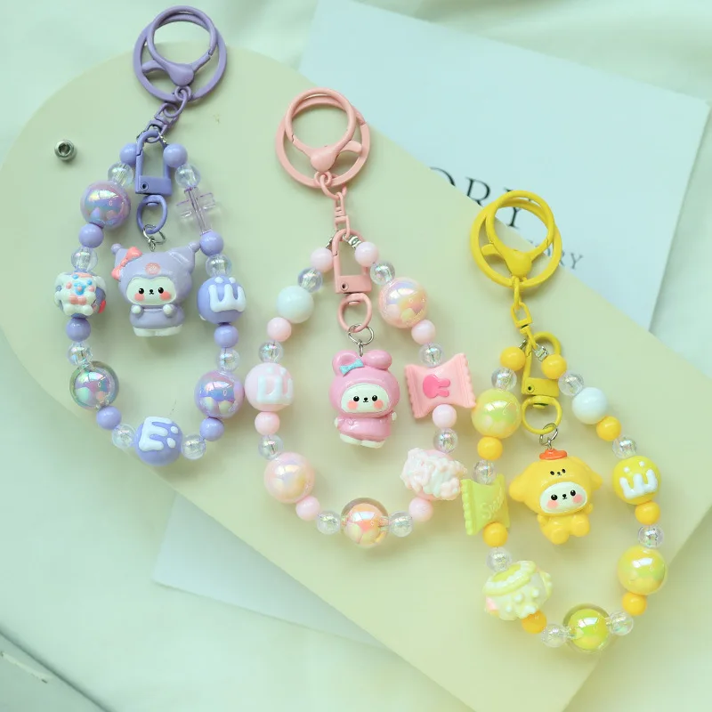 

New Liou resin figurine keychain pendant - cute cartoon KT pudding dog mini bag - perfect gift for students
