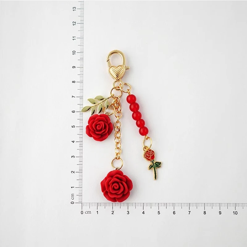 3D Rose Camellia Car Keychain Women Sweet Pearl Tassel Flower Keyring With Metal Leaf Bag Decoration Car Interior Accessories