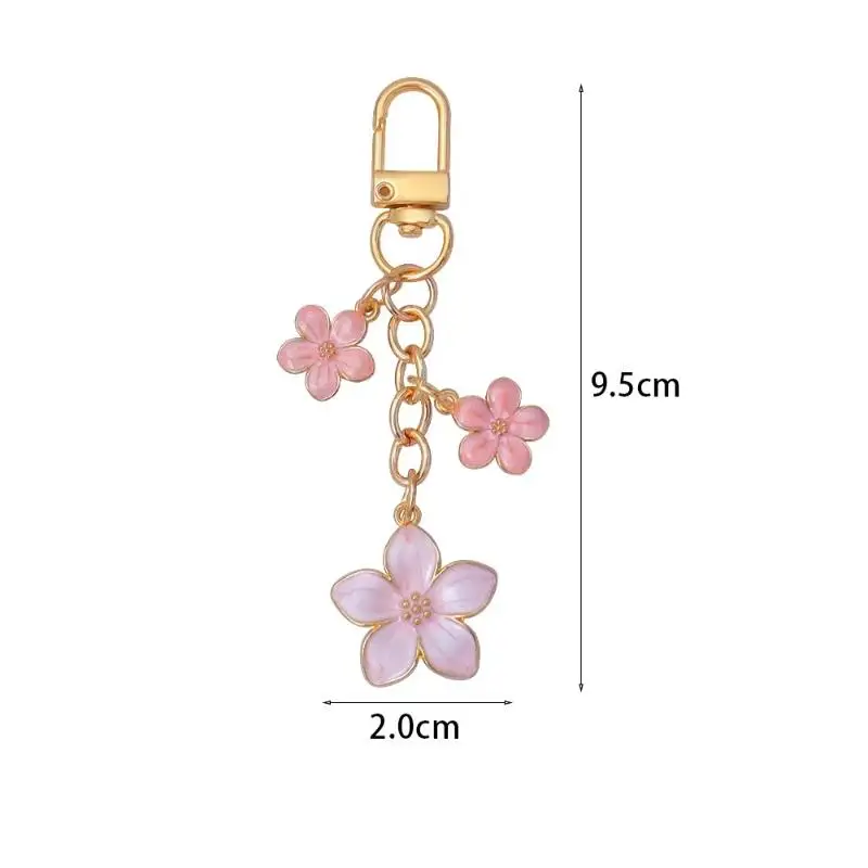 1 Stück Niedlicher Blumen-Schlüsselanhänger, Süßer Einfarbiger Drei-Kirschblüten-Anhänger, Schlüsselring für Damen-Handtaschen-Deko – Detail 12