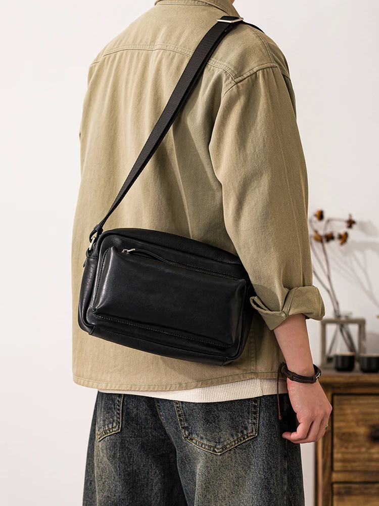 Simple casual handmade vegetable tanned cowhide men's crossbody bag outdoor commuting work genuine leather black shoulder bag