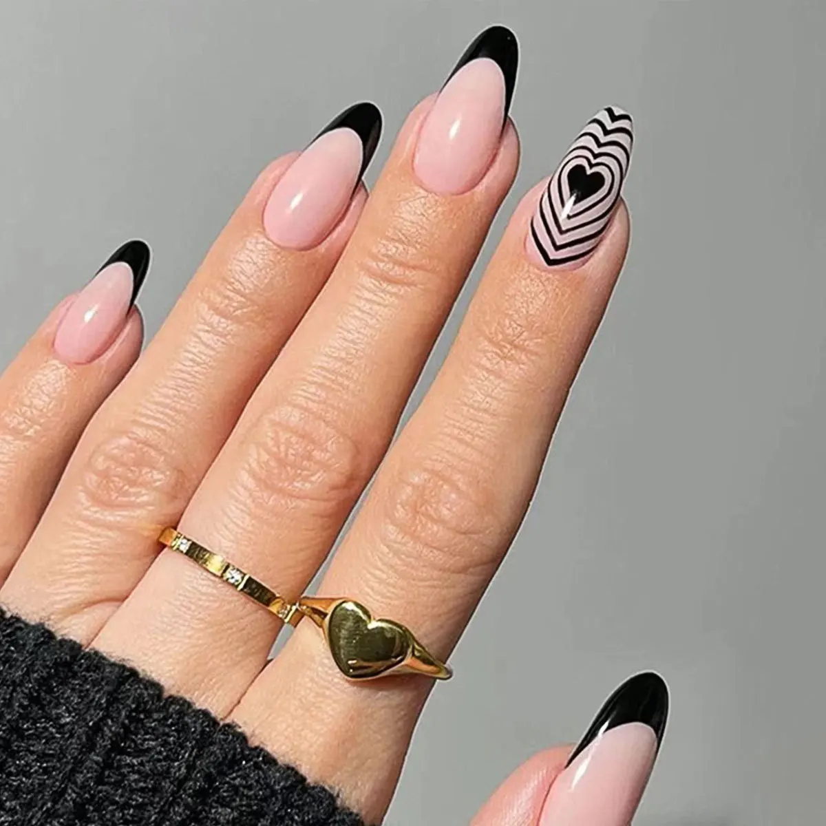 

Almond-shaped wearing nail simple black French psychedelic laminated love fake nail nail art piece