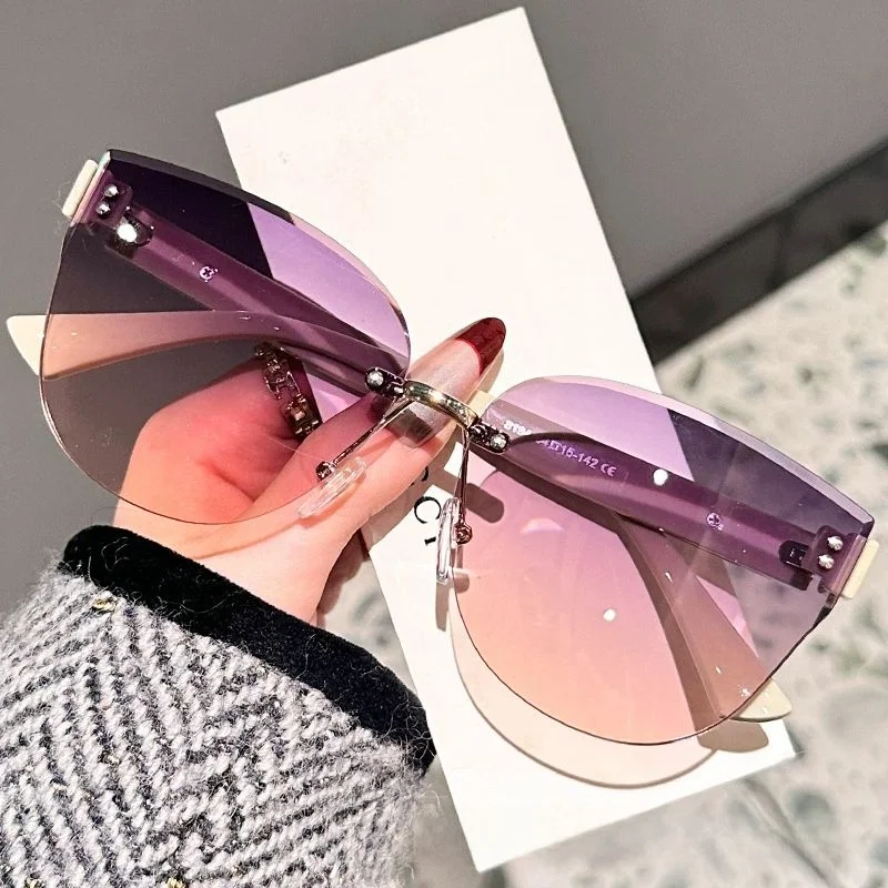 2026 Women's Curved Frameless Sunglasses DS-8194 Shiny Temple Small Fragrant Style Fashionable Eyewear for Ladies