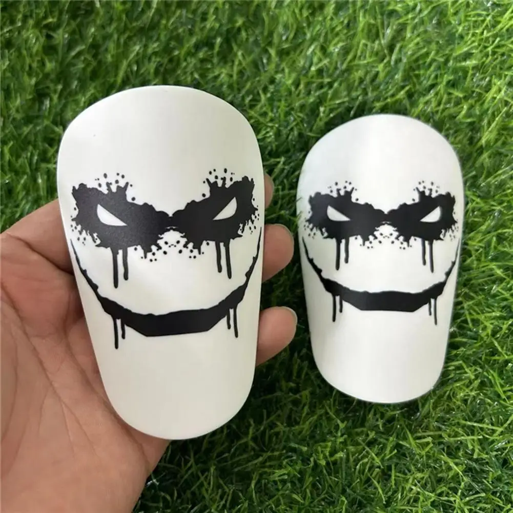 1 para mini piłkarskich ochraniaczy na golenie Cartoon EVA Foam Shin Guards Amortyzujące ochraniacze na nogi do piłki nożnej Trening piłki nożnej