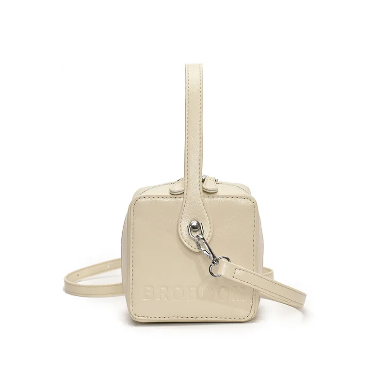 

white minimalist handbag for women in summer a mini sized bag with an trendy INS style silv