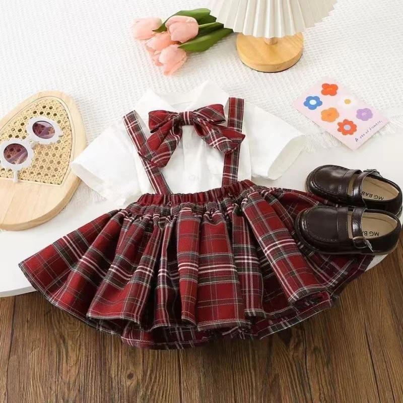 Girl JK Set 2026 New Summer Baby clothes set Children's Academy Style Short sleeved Shirt+Strap Skirt 2-piece Set