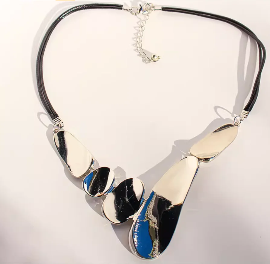 Foreign trade jewelry Europe and the United States fashion exaggerated irregular geometric necklace fold texture round earrings.