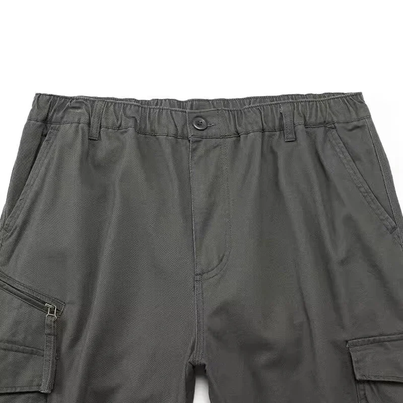 Moda cor sólida algodão calças casuais dos homens multi bolso calças de carga masculino baggy camuflagem calças suor solto ajuste plus size M-5XL